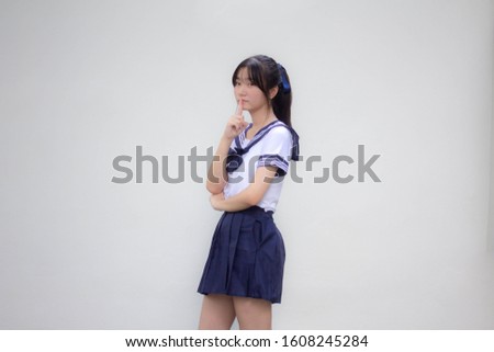 japanese teen beautiful girl in student uniform silently