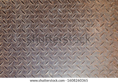 background of metal diamond plate in brown color