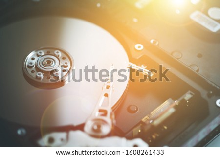Close up picture of computer hard drive, used in cloud computing. Sunlight. 