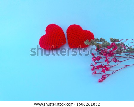 Two  hearts  handmade  and  dry  flower  on  white  background  image