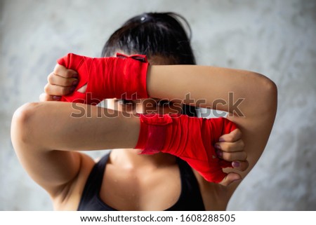 Amateur Kickboxers Training On Heavy Bags stock photo