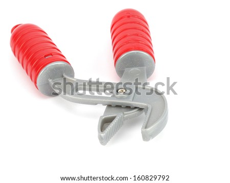 Plastic toy pliers on a white background