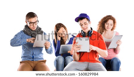 Group of young people with pc tablet, isolated on white background