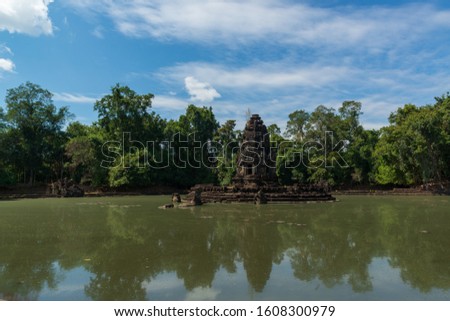Horse Balaha stands on the floor of the lake at Neak Pean or Neak Poan temple, Siem Reap, Cambodia. 
