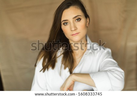 portrait of a girl in a white shirt