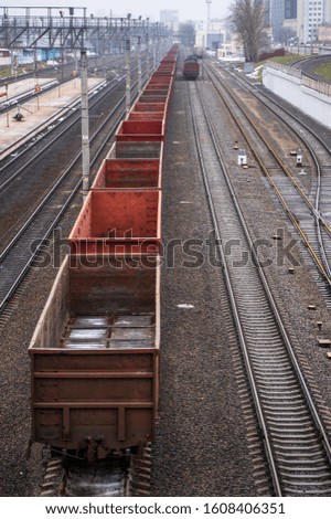 Picture of a freight train, top view. Empty containers. Cargo transportation