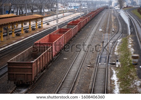 Picture of a freight train, top view. Empty containers. Cargo transportation