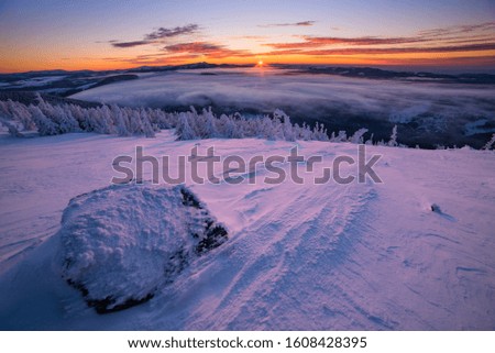  Winter sunset at Vladeasa Mountains. 06 January 2020, Apuseni, Transylvania, Romania.