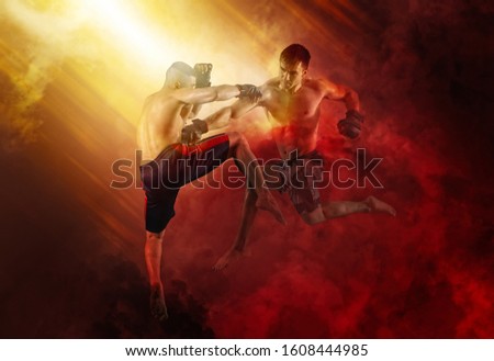 MMA boxers fighters fight in fights without rules on smoke background
 background
