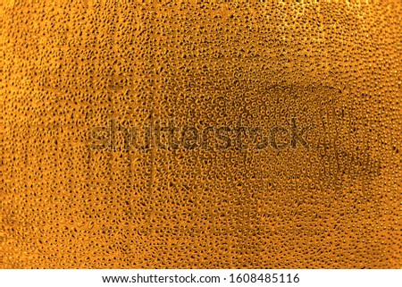 Orange abstract background. Abstract drops on an orange textured background. Blank for design and project.