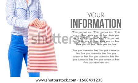 Woman in jeans and blue shirt red bag package in hand fashion buy sale macro on white background isolation, space for text