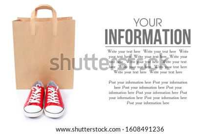 Red sneakers shopping bag package on a white background. Isolation, space for text