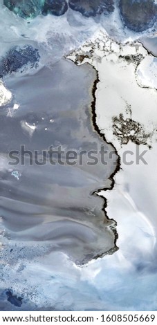 polluted Antarctica falling apart,, vertical abstract photography of the deserts of Africa from the air, imitating the polluted landscapes of Antarctica,