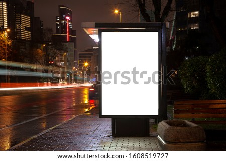 Blank billboard on night street