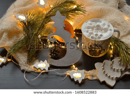 Stylish food photo, tangerines and coffee on a black background, winter decor