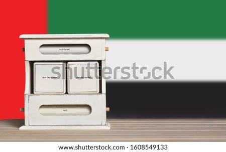 Retro calendar with free space for a date on the background of the flag of the United Arab Emirates. Template for writing dates of national holidays of the United Arab Emirates with free text space