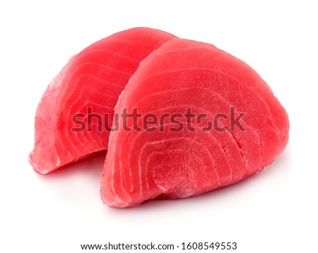 Fresh tuna. Fish steak on a white backgrounds. Royalty-Free Stock Photo #1608549553