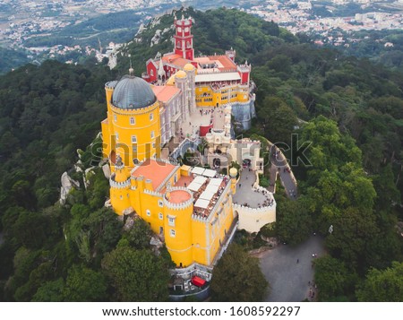 The Pena Palace, a Romanticist castle in the municipality of Sintra, Portugal, Lisbon district, Grande Lisboa, aerial view, shot from drone

