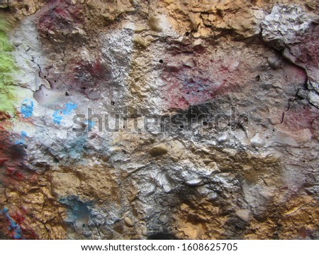 Abstract of an old concrete wall on the exterior of a crumbling building