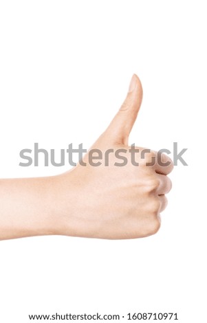 Woman hand make a thumb up isolated on white.