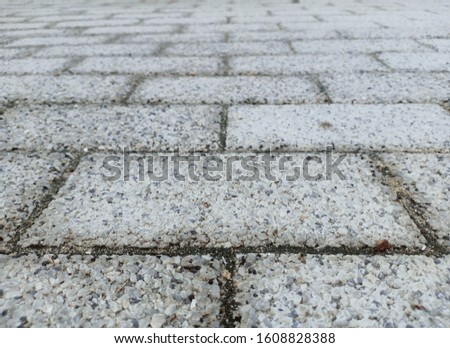 Cement block flooring. The surface of building materials.