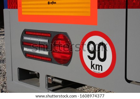 90 km sticker on truck