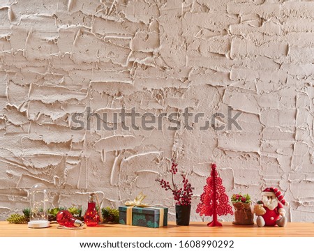 New year Christmas home concept on the wooden desk with objects accessory style, lamp and laptop.