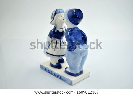 Ceramic dolls, a picture of a girl and a girl going to kiss each other To decorate the house beautifully