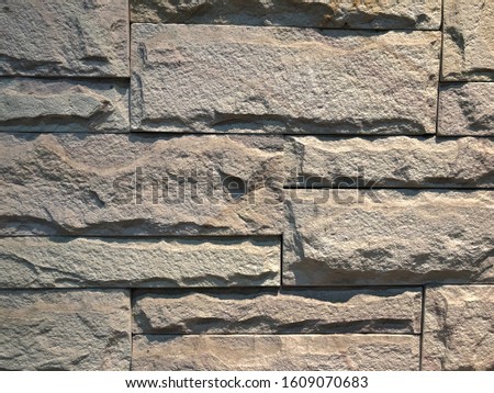 Closeup of stone background wall texture.