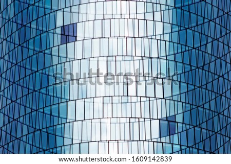 Double exposure photo of structural glazing. Modern architecture fragment with glass wall, ceiling or roof made of transparent panels. Abstract geometric background with irregular grid pattern.