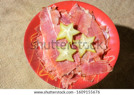 finger food and original appetizer of Italian fine cuisine raw ham, mushrooms