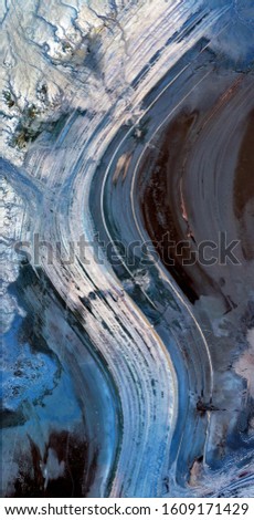 wind music, vertical abstract photography of the deserts of Africa from the air, aerial view of desert landscapes, Genre: Abstract Naturalism, from the abstract to the figurative,