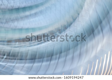 modern glass and concrete buildings with blurry background