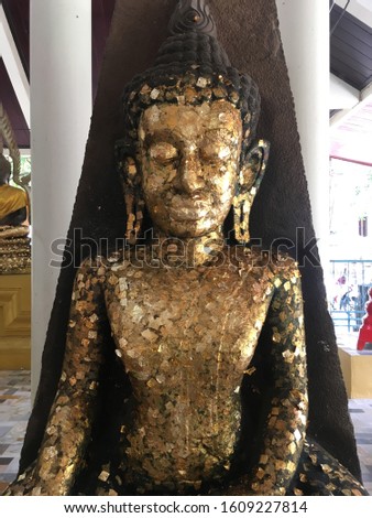 Historic golden Buddha sculpture at Wat Pho Bang Khla (temple), Chachoengsao, Thailand, Southeast Asia. The picture was taken in May 2018.