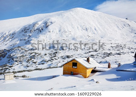 Wooden Mountain Chalet in the Winter .Rila Mountain in Bulgaria 