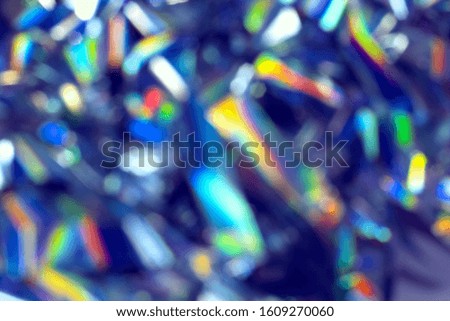 Abstract multicolored blue rainbow psychedelic light streaks background.