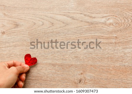 Heart paper and gift box on wooden background. happy valentine's day .