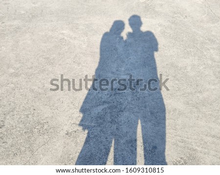 shadow of the couple lovers stand together with copy space