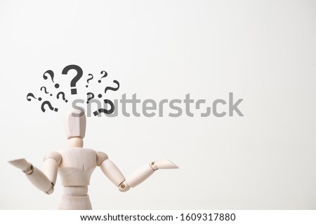 wooden mannequin dummy figure with doubtful gesture and question mark on white background - confusion and asking question concept