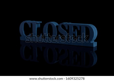 Blue color "closed" sign board. Sculpture board. Vintage wooden design.