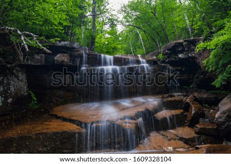 Long exposed falls deep within the forests of New Hampshire.