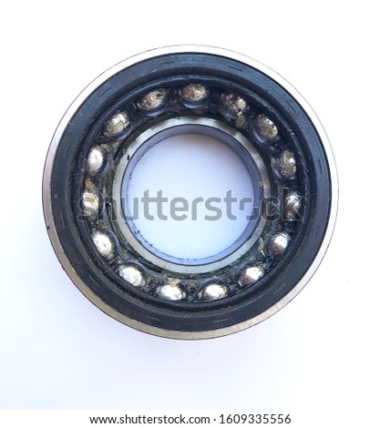 Car wheel bearing with grease inside, used spare part.