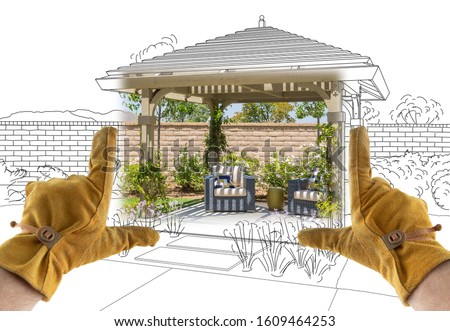 Male Contractor Hands Framing Completed Section of Custom Pergola Patio Cover Design Drawing. Royalty-Free Stock Photo #1609464253