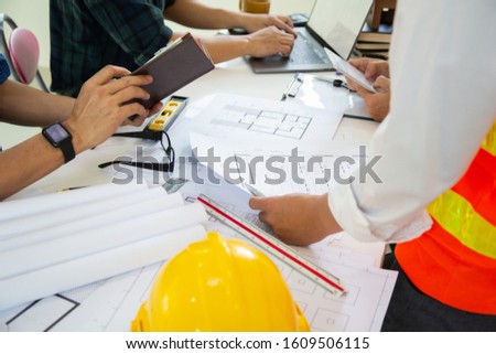 Team work Architectural work site desk background construction project ideas concept, With drawing equipment