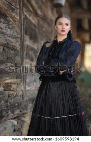 Young beautiful slovak woman in traditional costume.