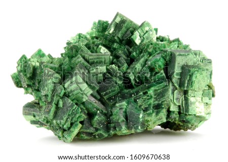 torbernite (uranium ore) from Margabal Mine, France isolated on white background Royalty-Free Stock Photo #1609670638