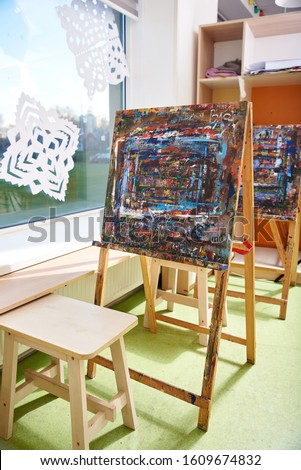 Artist easels in a children's studio studio