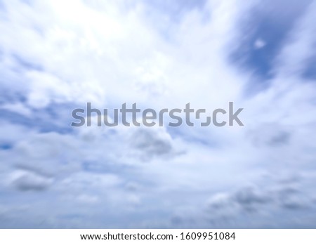 blue sky and white clouds abstract blur beautiful background and wallpaper.
