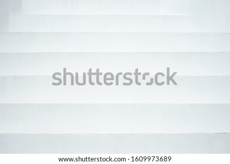 Closeup interior abstract white cement steps or stairs for texture or background Royalty-Free Stock Photo #1609973689