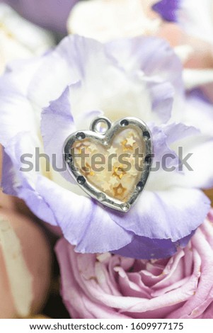 
heart pendant with flowers. Valentine's day